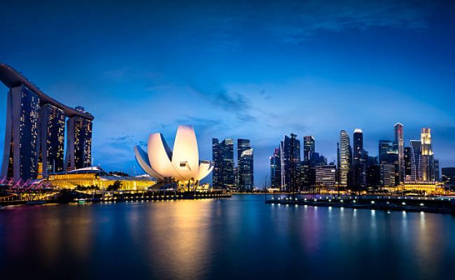 Marina bay Singapore at duskSingapore city skyline by nightSingapore city skyline at dusk